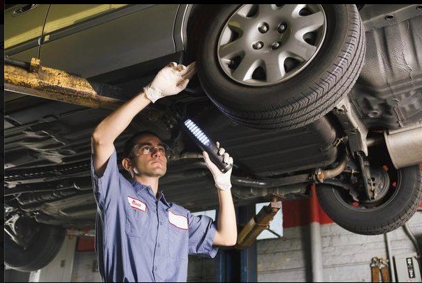 Our ASE Certified Auto Mechanic Servicing a vehicle at Clausen Automotive Shop located at 2118 S. Stoughton Rd. Madison, WI 53716. Call 608-221-8321 for more advice about vehicle inspection.